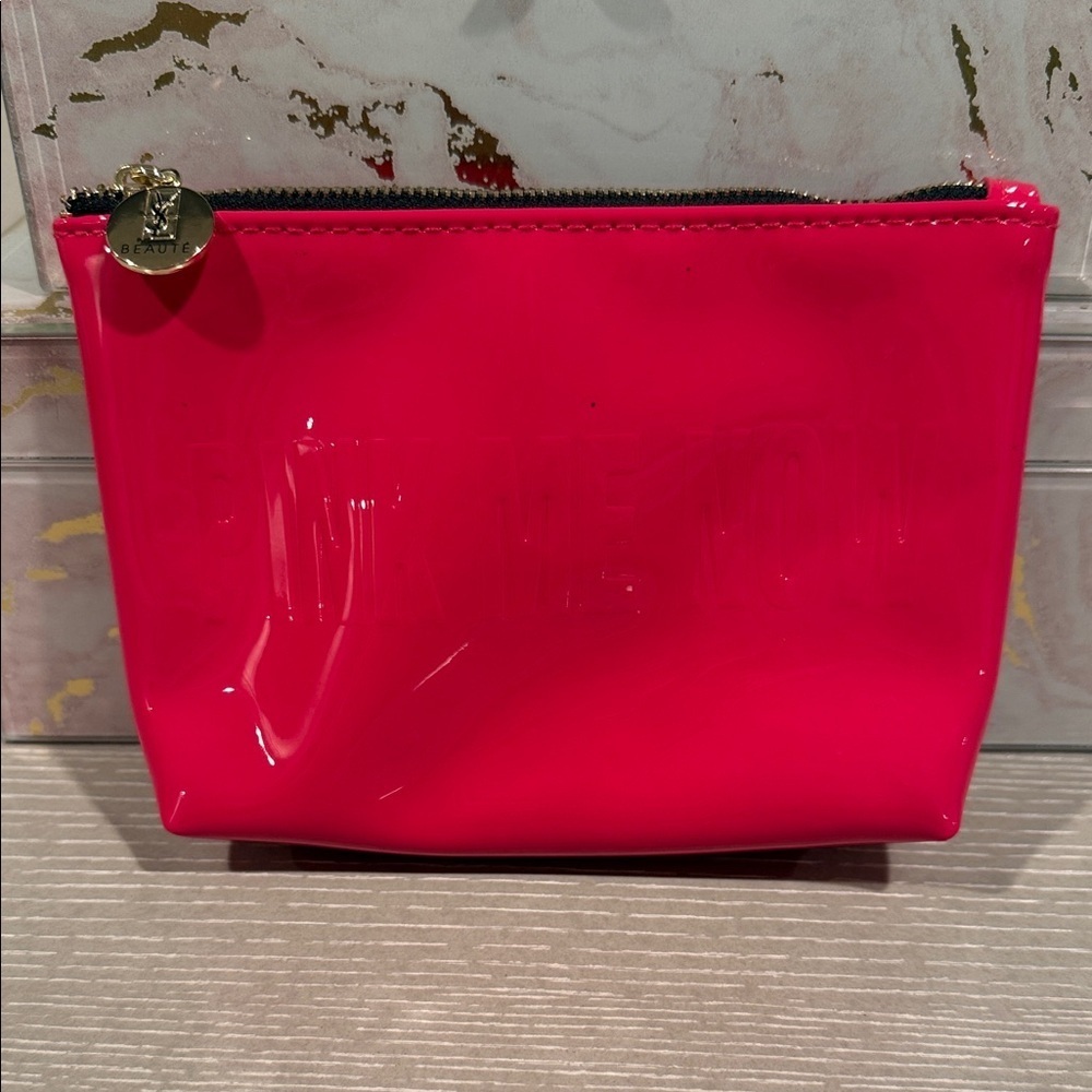 Vibrant Pink cosmetic bag by YSL Beaute “pink me now)